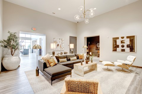 a living room with a couch and a table